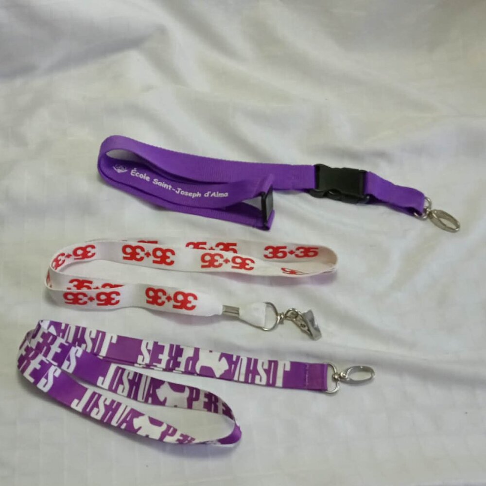 Three identification straps/lineyards/idcords, including one by Joshua Perets